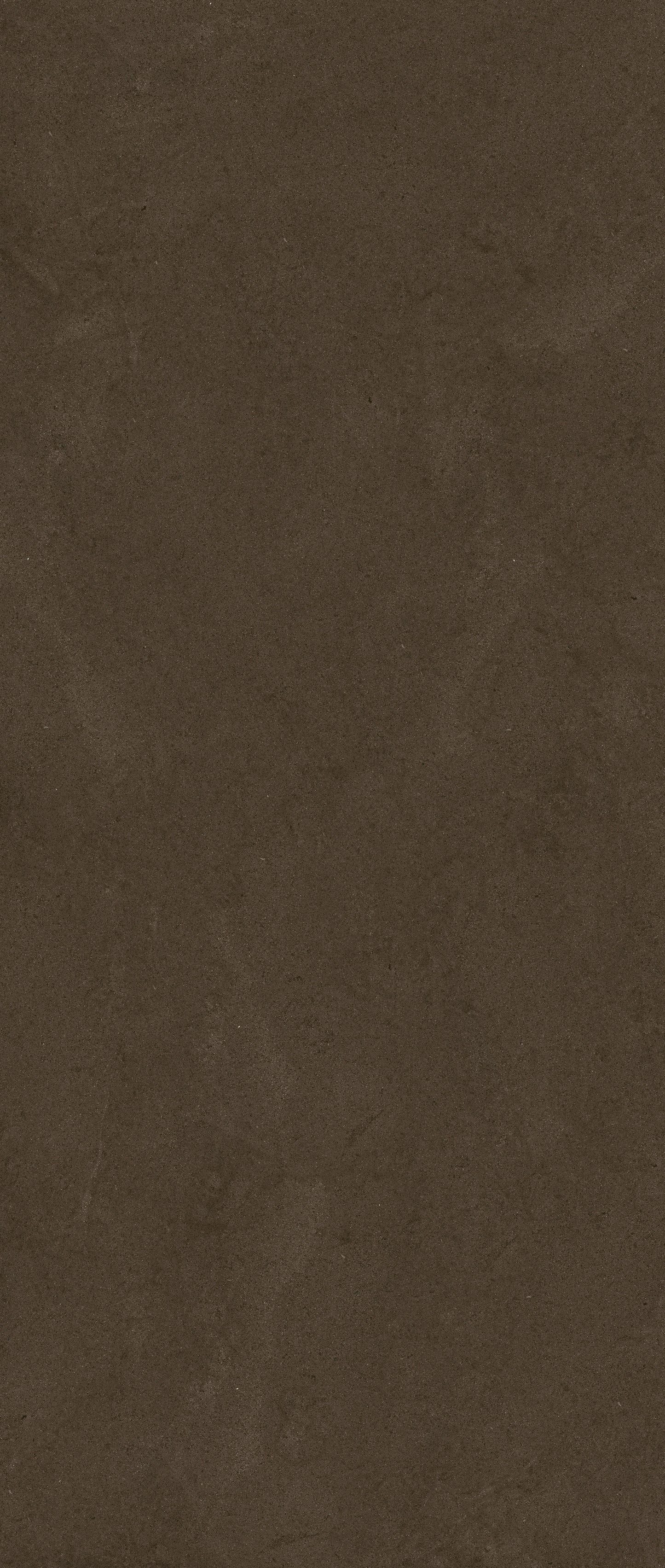 SKIN DUST BROWN matt; 3MM-120x300- Ez a nagy csempe a földszínek nyugalmát és a természetes felületek szépségét hozza otthonába, meleg barna árnyalatai és finom textúrája pedig mélységet és otthonos hangulatot teremtenek.