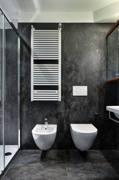 LAMINAM OXIDE NERO 100x300; Az Oxide Nero mély fekete és antracitszürke árnyalataival kifinomultságot, időtlenséget és modern hangulatot ad a térnek, beltéri és kültéri használatra egyaránt alkalmas.